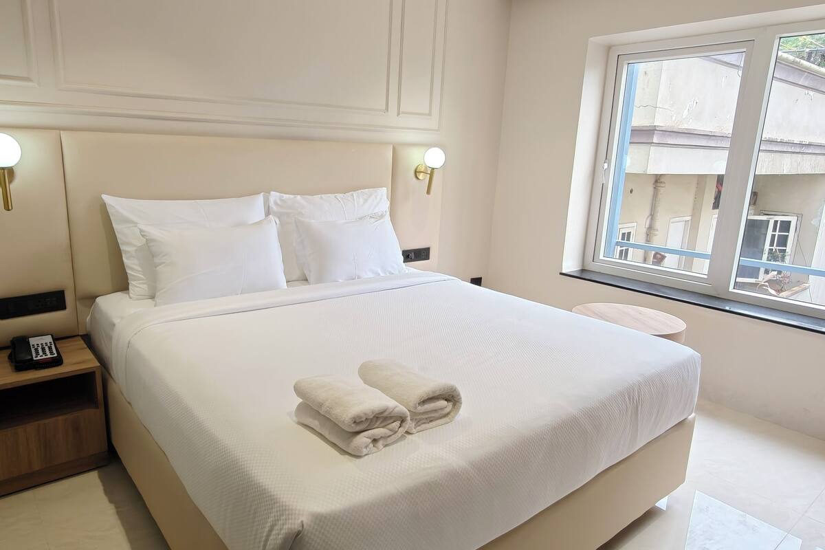 Premium Room | In-room safe, desk, laptop workspace, blackout curtains