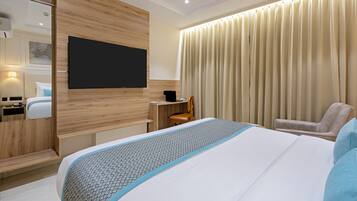 Superior Room | In-room safe, desk, laptop workspace, blackout drapes