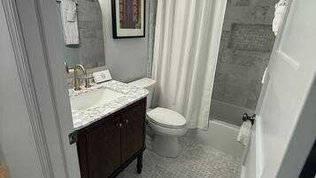 Hair dryer, towels, soap, shampoo