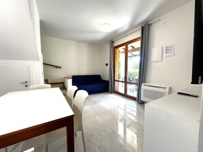 Villa, 3 Bedrooms, Patio, Garden View | Dining room - Comfy Bibione Villa With Pool Access (San Michele al Tagliamento)