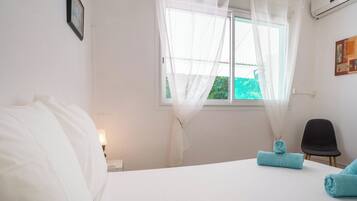 4 chambres, lit parapluie, draps fournis