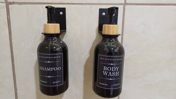 Shower, hair dryer, towels, soap