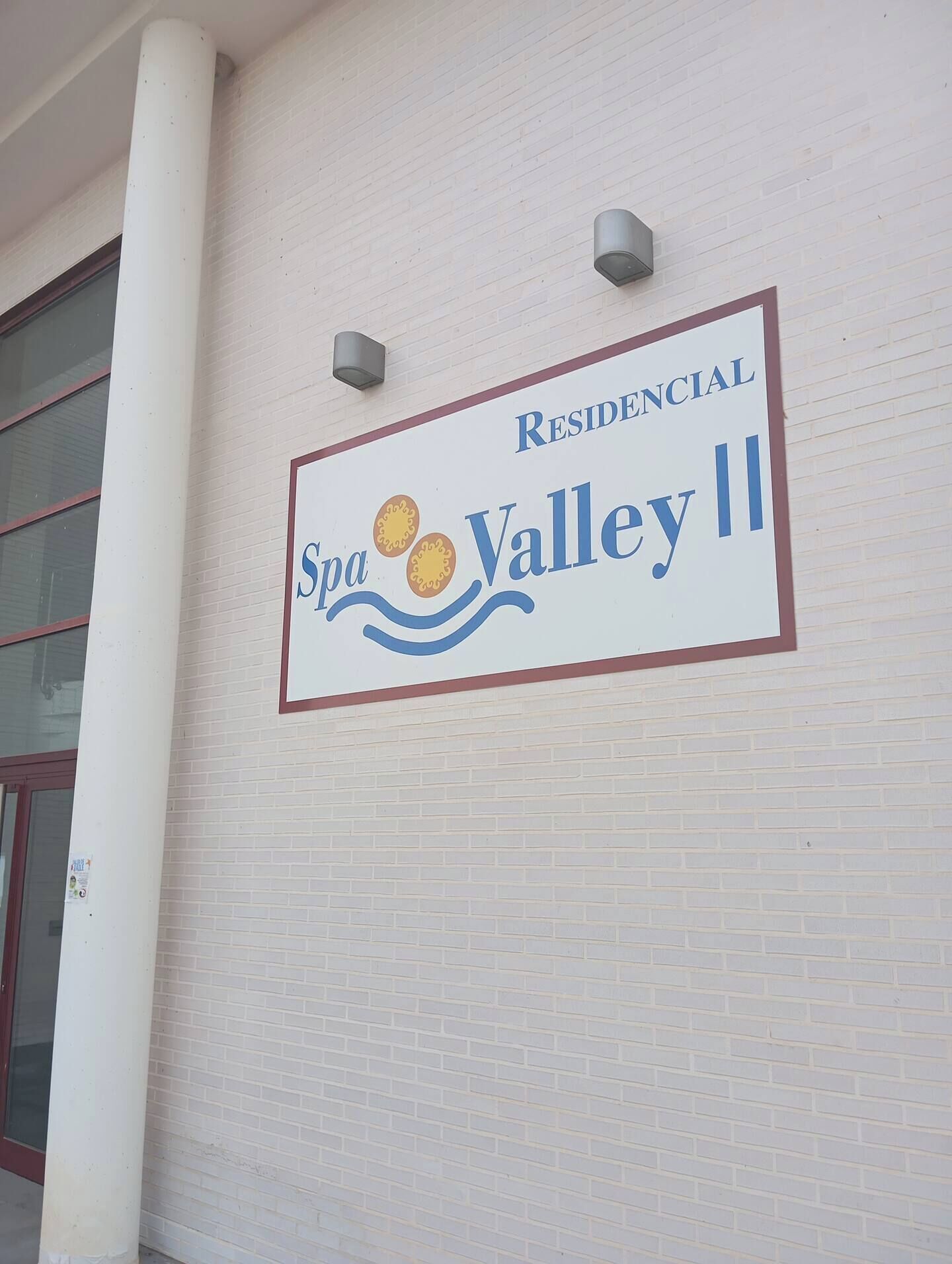 A sign for Spa Valley II, indicating it is a residential hotel.
