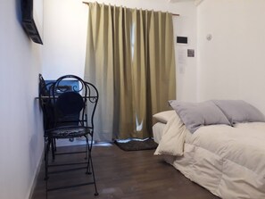 Habitación, 1 habitación, vista al jardín | 1 habitación 