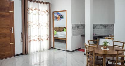 “Airport and Paddy View Homestay — your second home near the airport.”