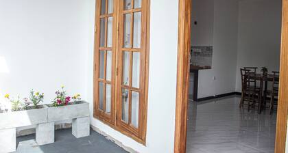 “Airport and Paddy View Homestay — your second home near the airport.”