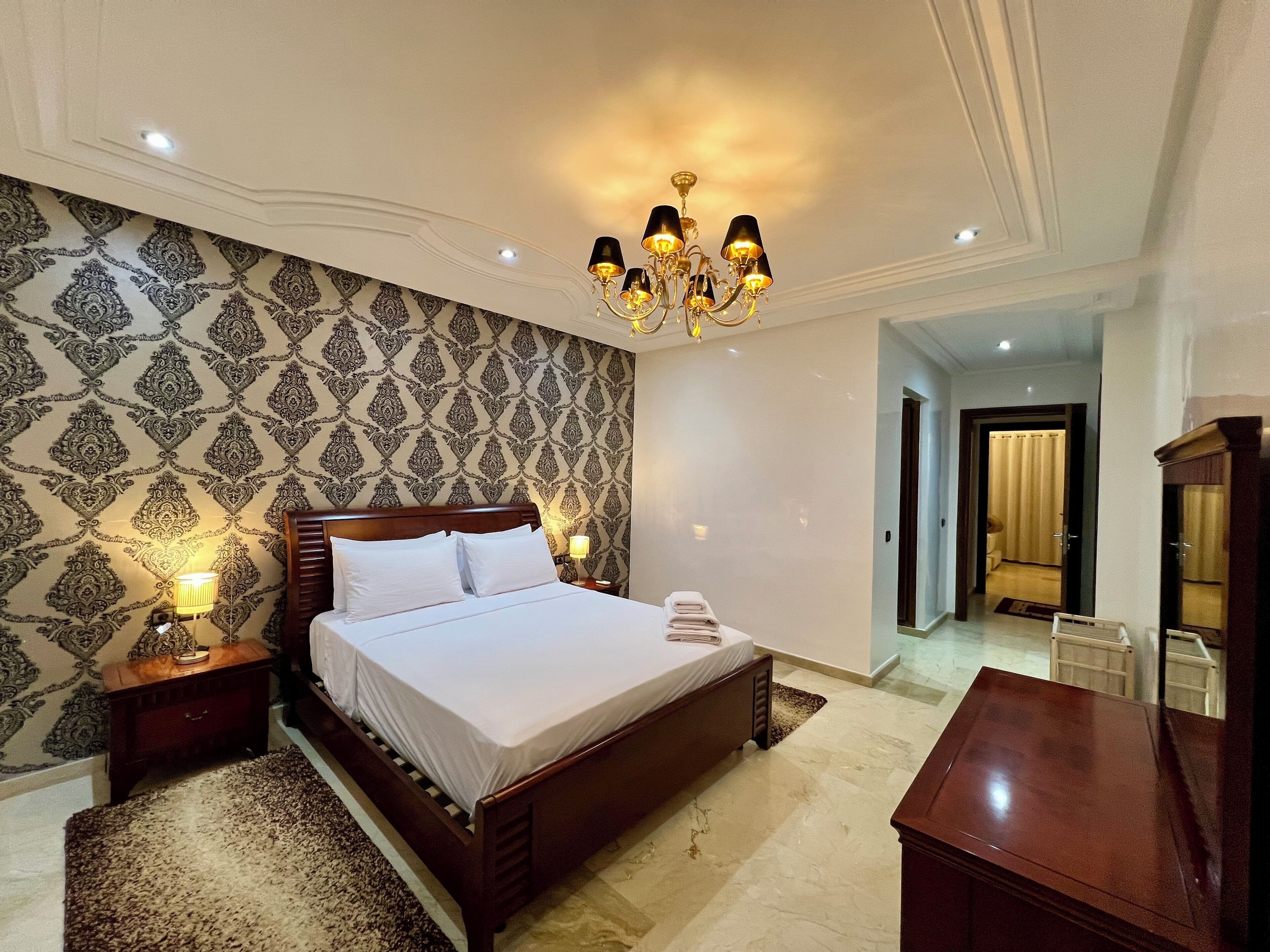 Deluxe Apartment, Balcony, City View | In-room safe, blackout curtains, soundproofing, iron/ironing board