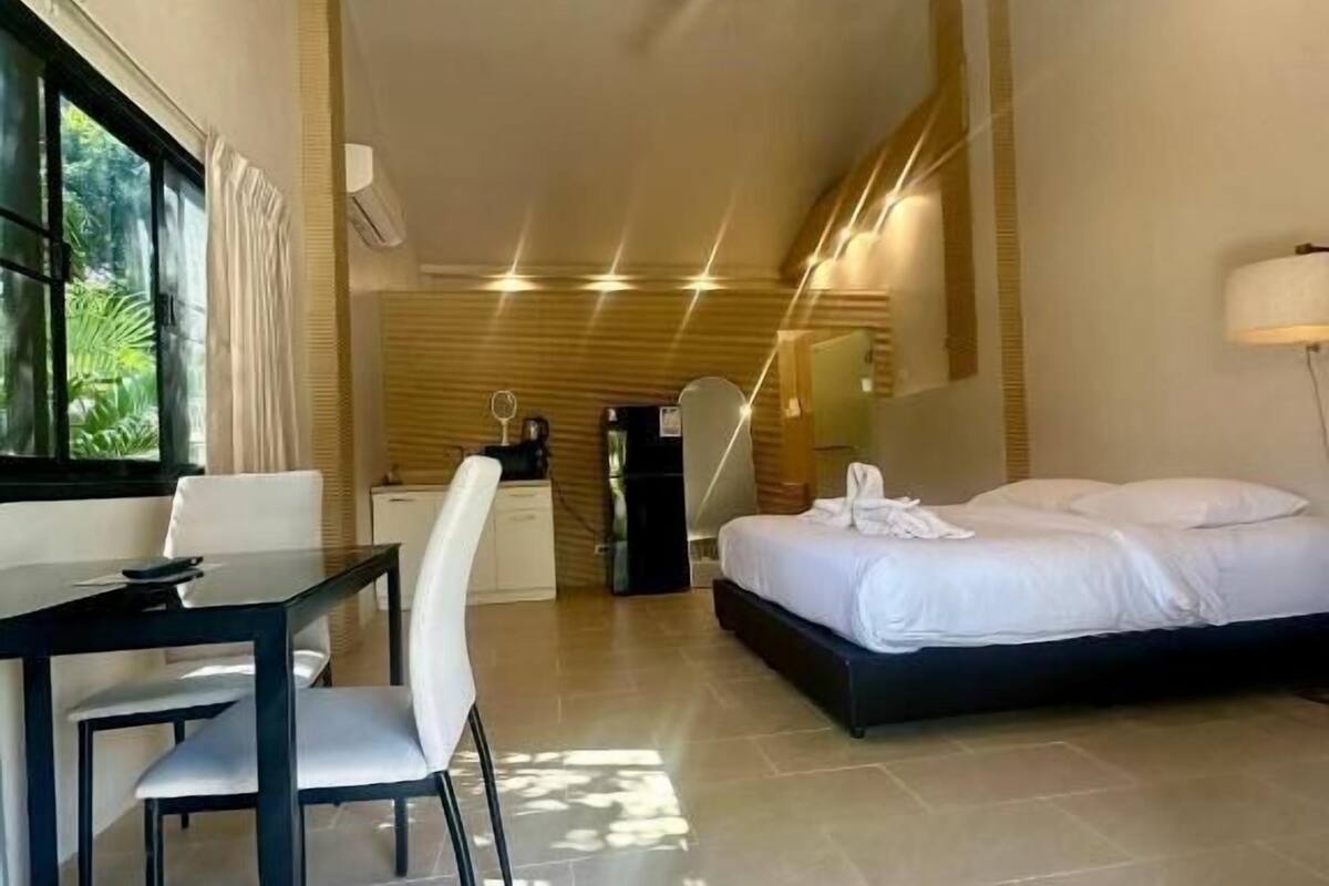 Deluxe Double Room, Pool View | In-room safe, iron/ironing board, free WiFi