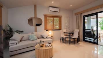 Deluxe Villa, Balcony, Pool View | In-room safe, iron/ironing board, free WiFi