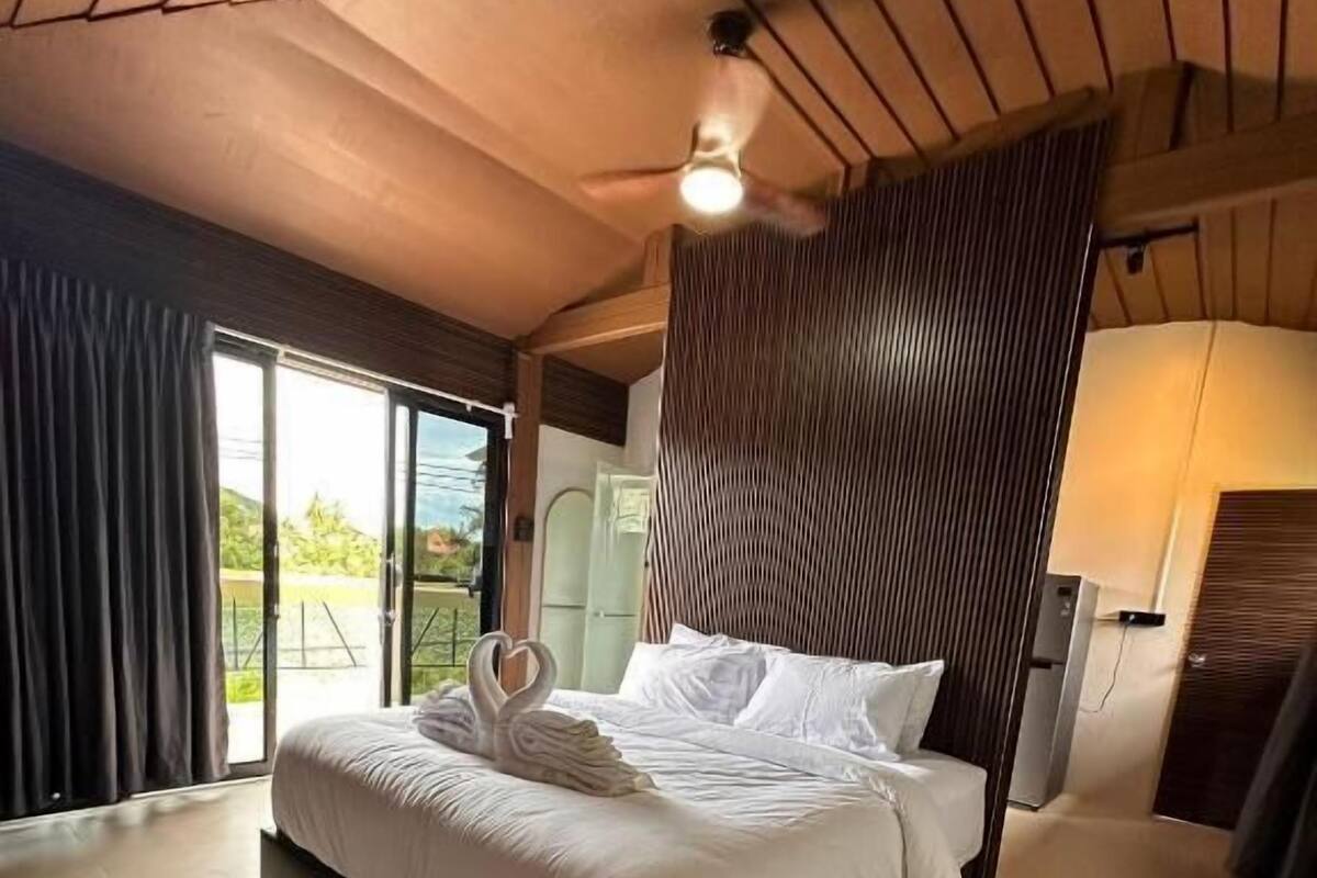 Deluxe Suite, Balcony, Lake View | In-room safe, iron/ironing board, free WiFi