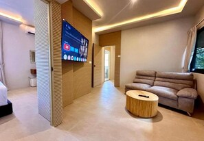 Deluxe Apartment, Pool View | In-room safe, iron/ironing board, free WiFi