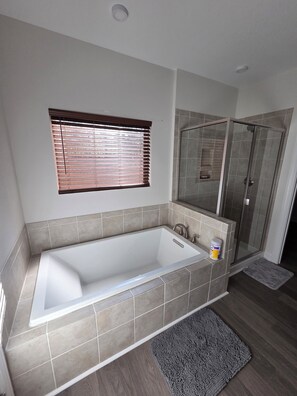 Jetted tub, hair dryer, towels, soap
