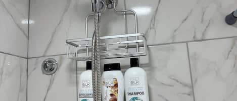Hair dryer, towels, soap, shampoo