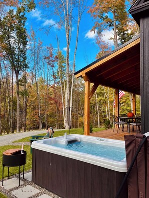 Outdoor dining - Brand-new, PRIVATE 3-bed mountain retreat w/ hiking trails, HOT TUB, fire pit! (Pownal)