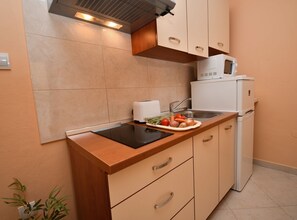 Fridge, microwave, coffee/tea maker, toaster