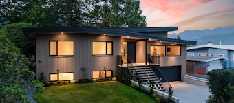 Enjoy the mountains and the ocean from this clean and cozy Deep Cove Suite