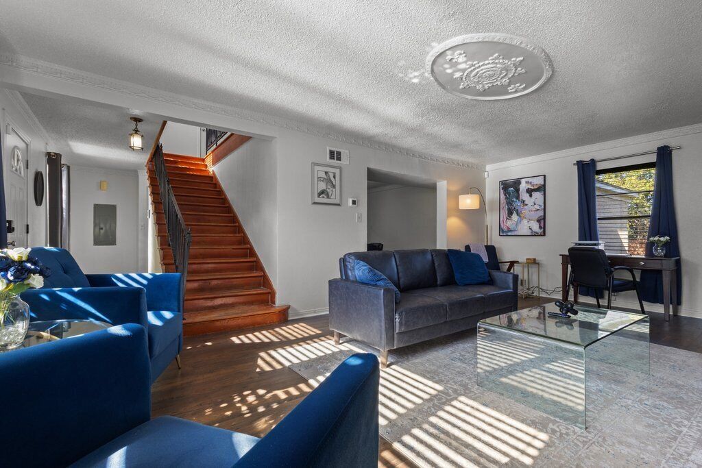 Smart TV, fireplace, books, printers