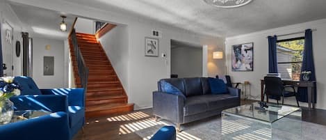 Smart TV, fireplace, books, printers