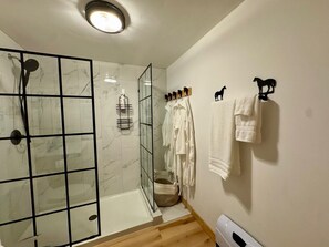Shower, hair dryer, towels, soap