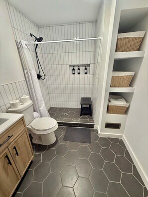Shower, hair dryer, towels, soap