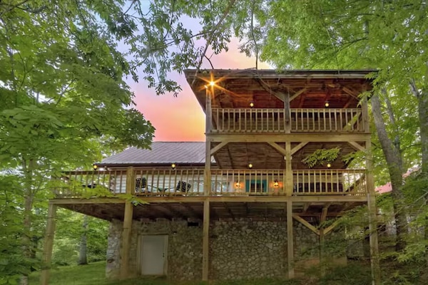 Gorgeous views into 2.5 hilltop acres for this property.