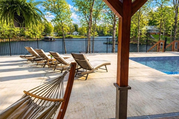 Relax in the pool overlooking the water with stunning sunrise and sunset views!