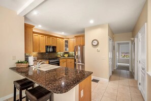 Fridge, microwave, oven, stovetop - Poipu Luxury — 2BR 2BA A/C Condo with Resort Amenities, Walk to Beaches & Trails (Koloa)