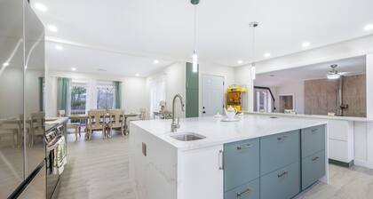 Features two living rooms, sauna, hot tub, and fire pit -over 4 acres of land.