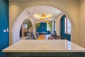 Design Studio Suite, Beach View | Living area | 45-inch Smart TV with digital channels - Lotus Home Cafe – Budget (Phu Quoc)
