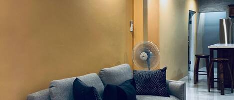 Apartamento família, para não fumantes, ar-condicionado | Área de estar