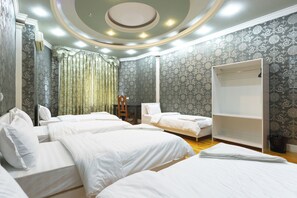 Family Room, Courtyard View | Laptop workspace, blackout drapes, iron/ironing board, free WiFi