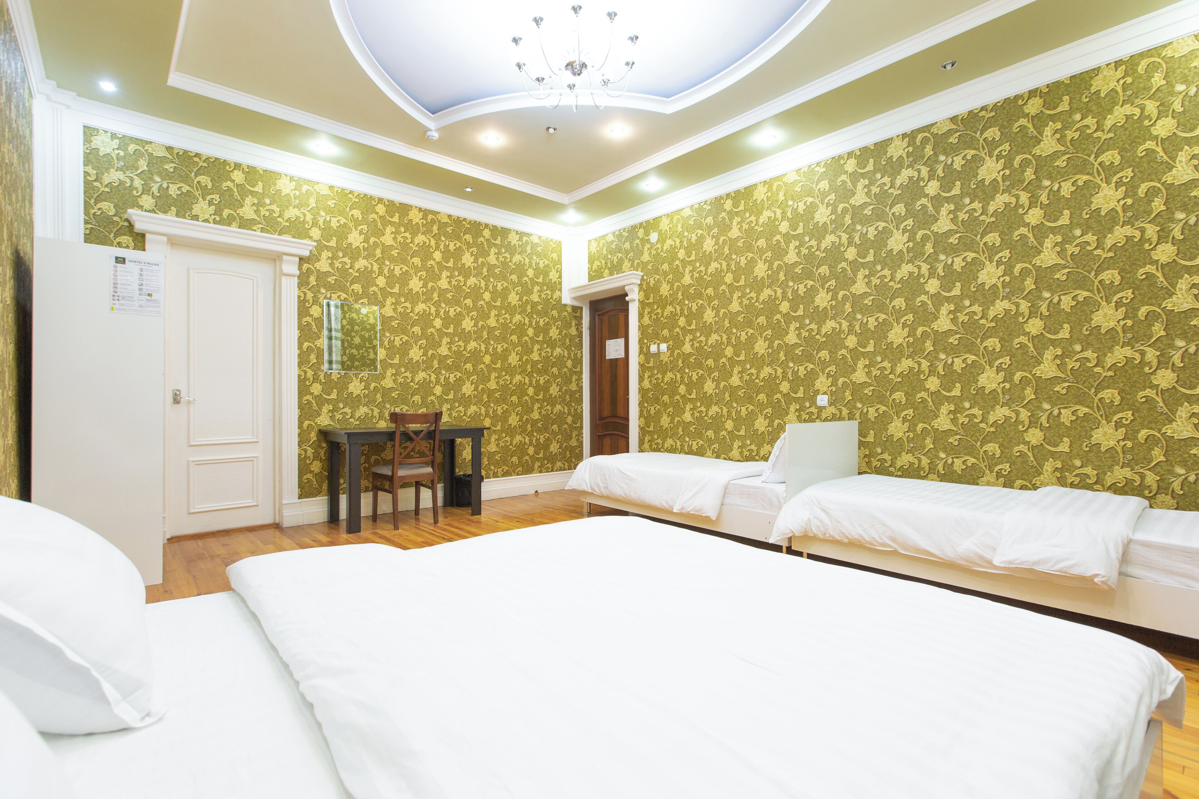 Standard Quadruple Room | Laptop workspace, blackout drapes, iron/ironing board, free WiFi