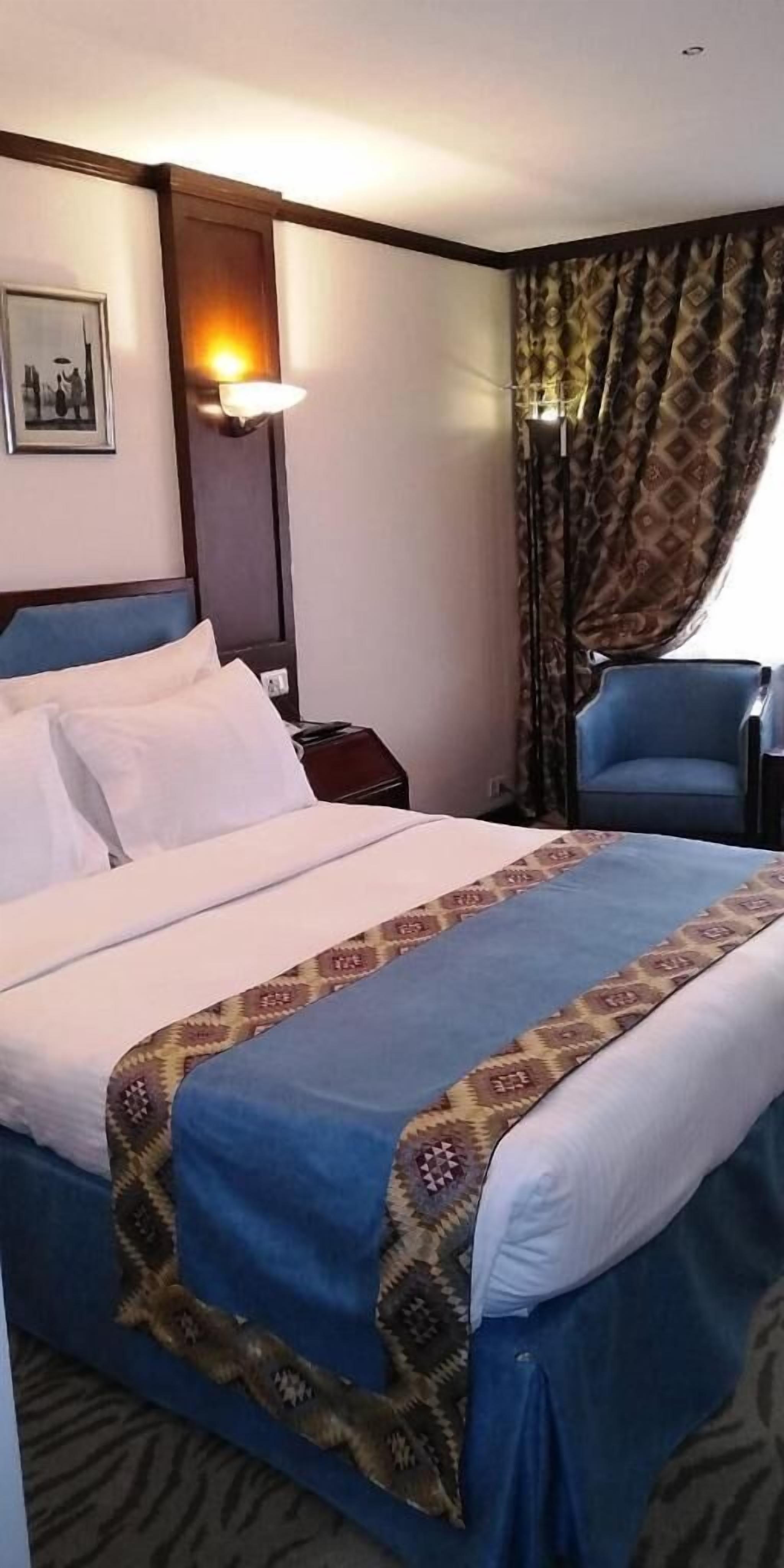 In-room safe, desk, laptop workspace