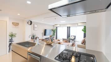 Suíte superluxo, sacada, vista para a cidade | Cozinha privada