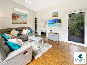 Living area - Family-Friendly 3BR Villa with Pools, Spa & Starlink with in the Ramada Resort (Cowes)