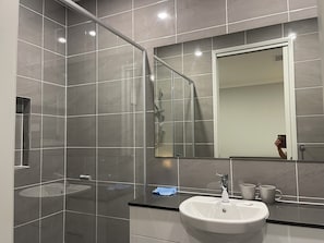 Shower, hair dryer, towels, soap