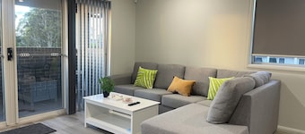 Modern, comfortable with stunning Inlet-sunset-view Home in the heart of Narooma