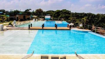 Outdoor pool, pool umbrellas, sun loungers