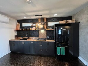 Fridge, microwave, coffee/tea maker, toaster