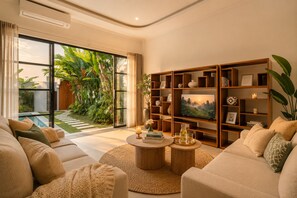 Superior villa, kilátással a medencére | Nappalirész
