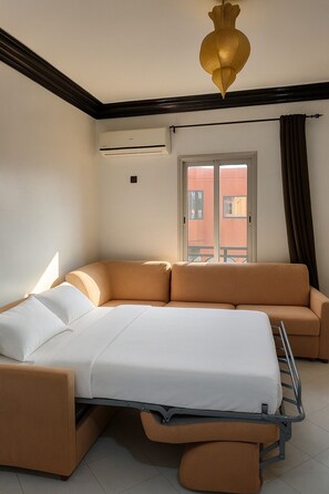 Appartement Deluxe, balcon | Coin séjour
