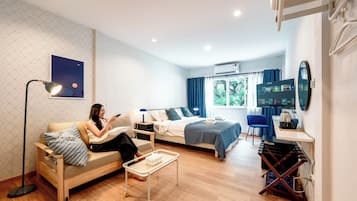 Deluxe King Room | Blackout drapes, iron/ironing board, free WiFi, bed sheets