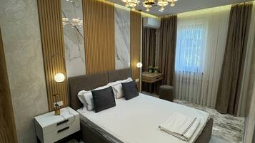 2 habitaciones, tabla de planchar con plancha y internet