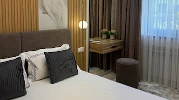 2 habitaciones, tabla de planchar con plancha y internet