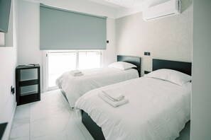 2 bedrooms, iron/ironing board, free WiFi, bed sheets - Family-Friendly 2BR Apt at Mackenzie Area, Pool available, 10 Min Walk to Beach! (Larnaka)