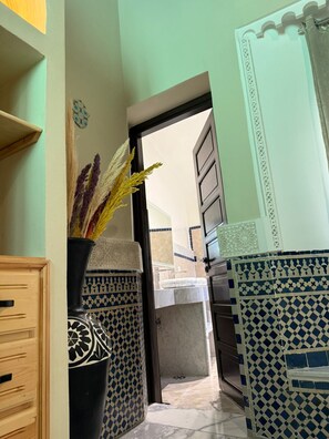 Designer toiletries, hair dryer, heated floors, towels