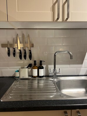 Fridge, microwave, dishwasher, coffee/tea maker