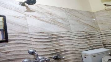 Shower, rainfall showerhead, towels, soap