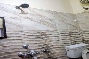 Shower, rainfall showerhead, towels, soap