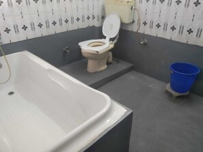Family Room, Air conditioning | Bathroom | Shower, designer toiletries, towels, soap